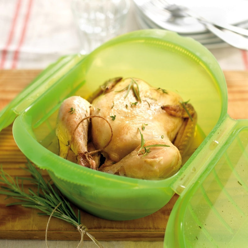 Lékué green steam case with roast chicken