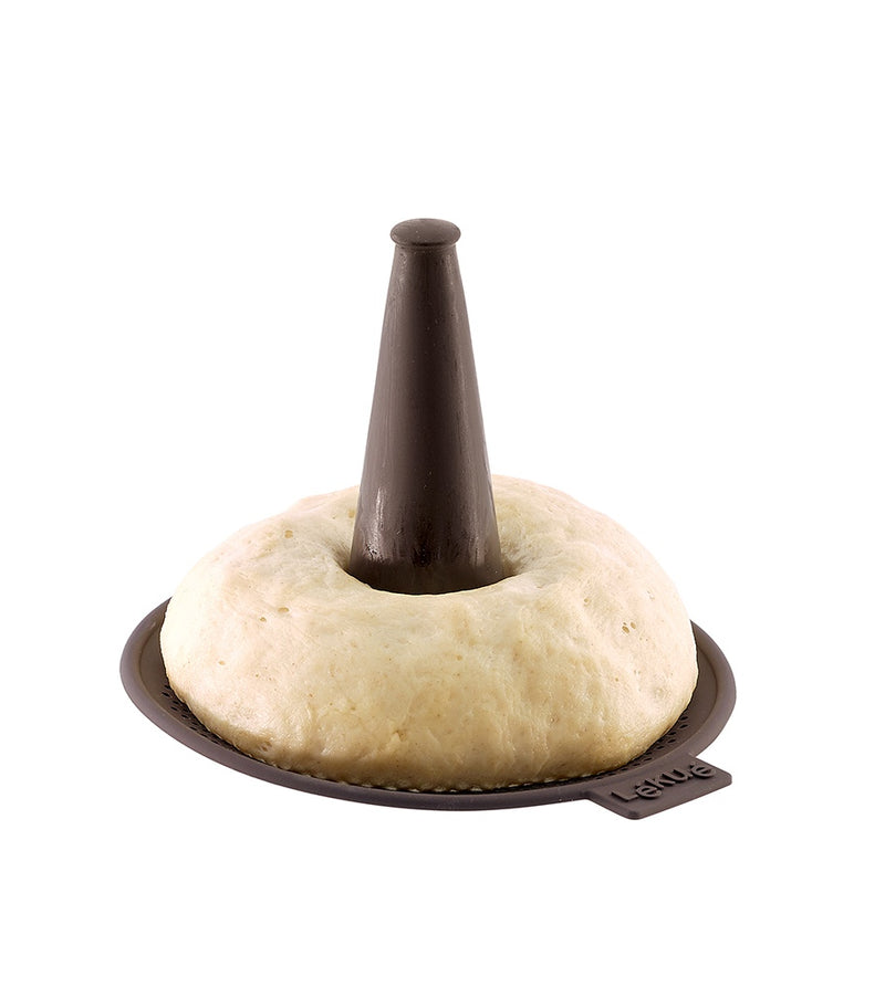 One Lékué bagel mould shown with dough; set includes six moulds