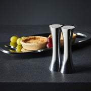 Nambé Kissing Salt & Pepper Shakers, Set of 2 in a display setting; other items shown are sold separately.