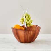 Nambé Fruit Tree Bowl with Banana Hanger in a display setting; other items shown are sold separately.