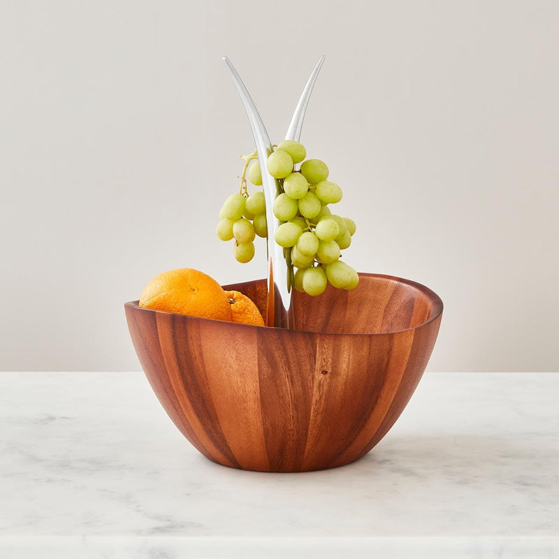Nambé Fruit Tree Bowl with Banana Hanger in a display setting; other items shown are sold separately.