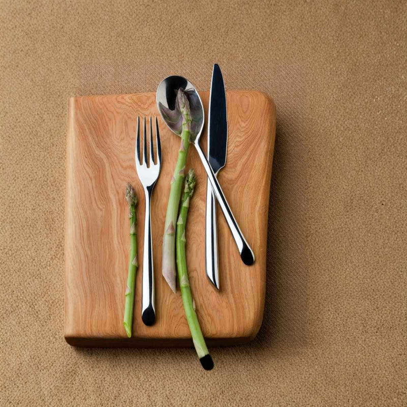 Nambé Frond 5-Piece Place Setting in a display setting; other items shown are sold separately.
