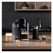Nespresso ENV135BAECA Piano Black factory-serviced model – machine and frother in a kitchen setting