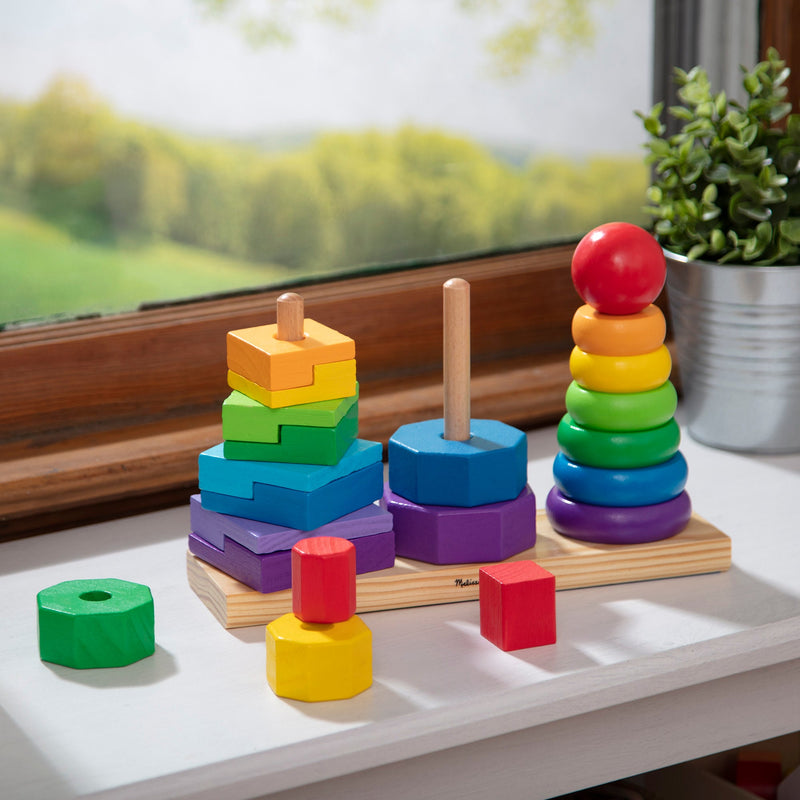 Melissa & Doug - Geometric Stacker - 21 Wooden Pieces - in use during play