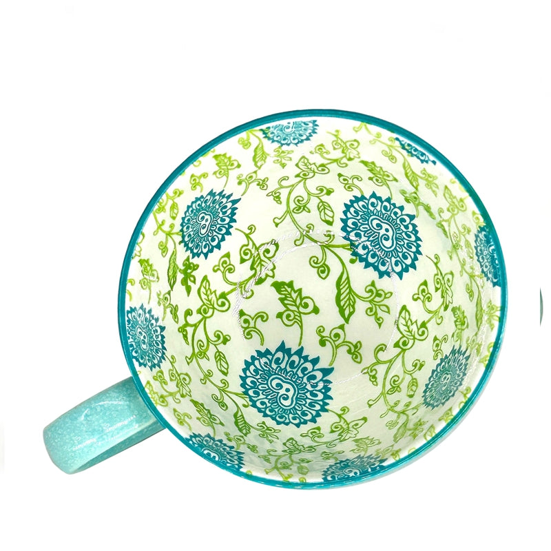 Danesco textured stoneware cup, turquoise Floral pattern, interior detail