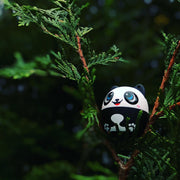 My Audio Pet PANDAmonium the Panda speaker photographed in a tree