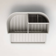 Top view of the Umbra Stash organizer showing its removable divider and compartments