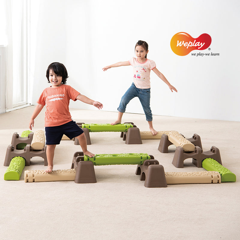 Weplay Jungle Trial balance path, children using a complete loop of logs and bases