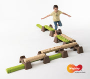 Weplay Jungle Trial, child walking on a narrow raised log route